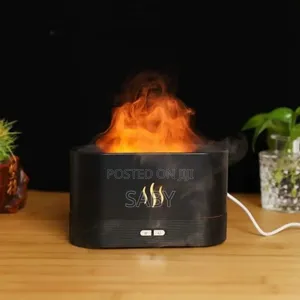 Photo - በኤሌክትሪክ የሚሰራ Flame Aroma Humidifiers