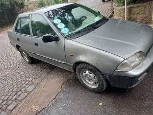 Photo - Suzuki Swift 1990 Gray