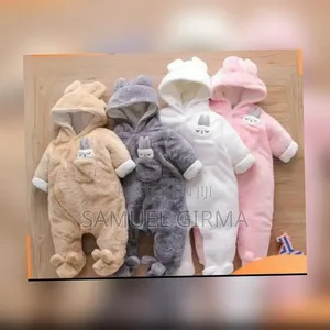 Photo -  ከላዩ ፈር ውስጡ ኮተን የሆነ 
 ከቅዝቃዜ ልጆችን የሚገላግል ለብርድ የሚከላከል