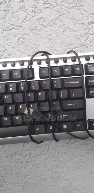 Photo - Computer Keyboard, Vga Cable, Hdmi Convertor And Power Cable