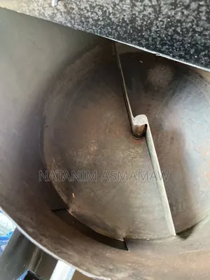 Photo - Coffee Grinding የቡና መቁያ ማሽን