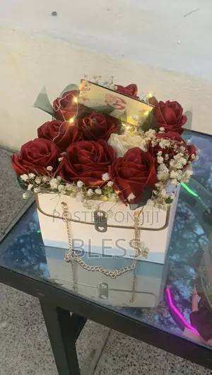 Red And White Ribbon Flowers With White Bag And Led Lights