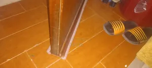 የአቧራ እና የበር ስር ክፍተት መዝጊያ