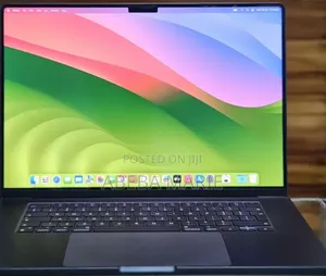 Photo - New Apple MacBook Pro 2023 M3 14-Inch 18GB Apple M3 Pro SSD 512GB