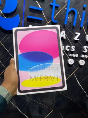 Photo - New Apple iPad (2025) 128 GB Red