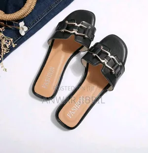 Elegant Black Slip-on Sandals- Gold Buckle Design