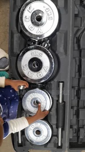 Photo - Zemenawi Dambbell and Barbell