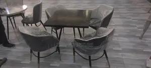 Photo - Hotel Restaurant Dining Table Four Chairs Metal Legs