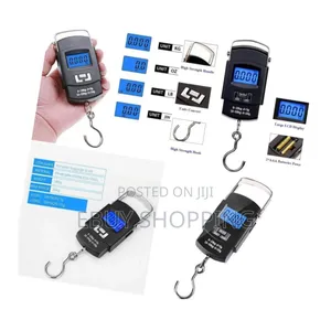 Photo - 50kg Digital Pocket Scale–Perfect for Suitcases, Parcels