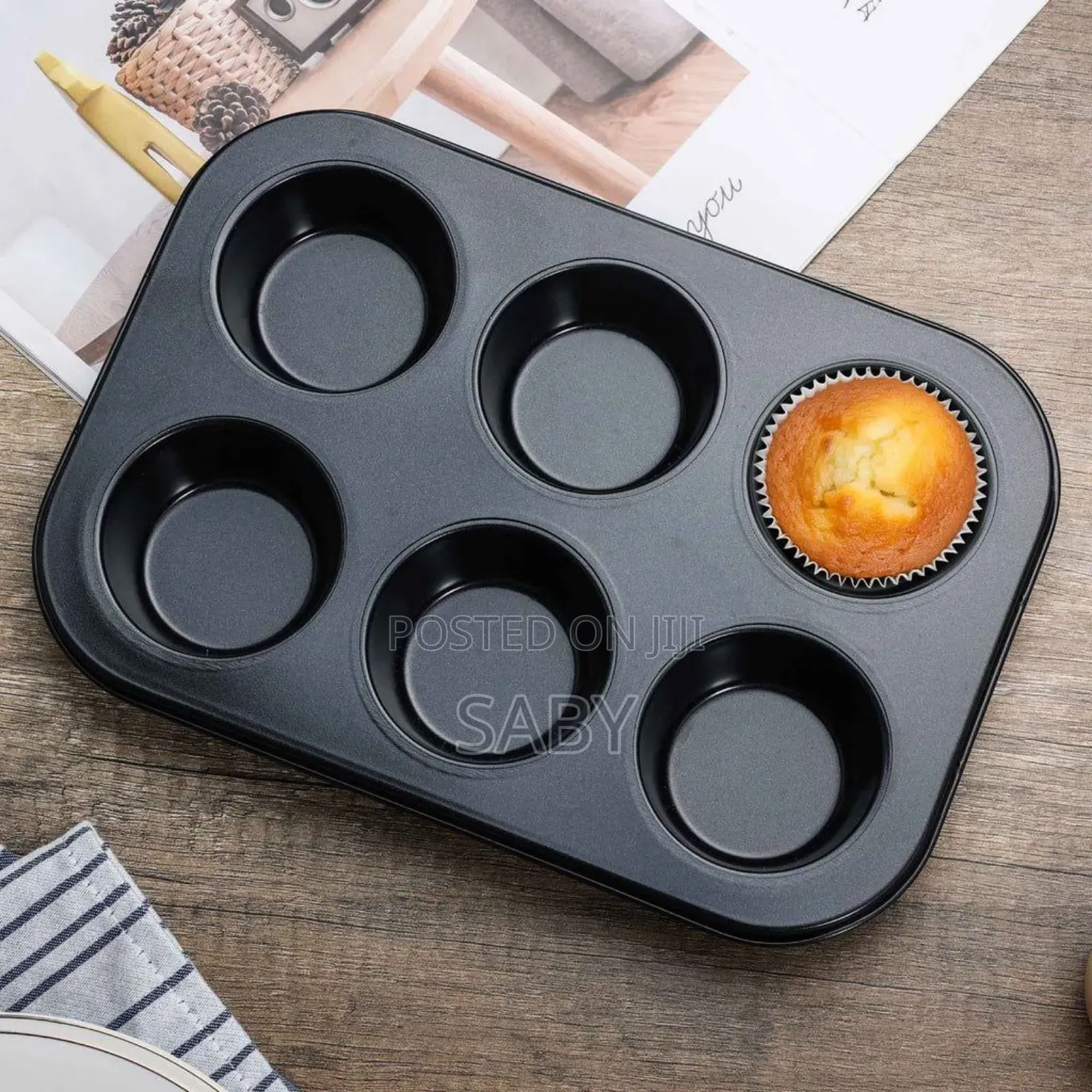 A Muffin Tin, Typically Used For Baking Muffins Or Cupcakes.