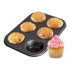 A Muffin Tin, Typically Used For Baking Muffins Or Cupcakes.
