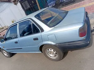 Photo - Toyota Corolla 1991 Burgundy