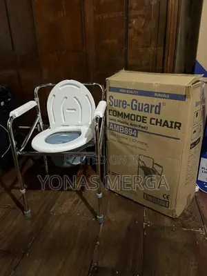 Photo - Commode Chair With Plastic Arms Plus Plastic Bath