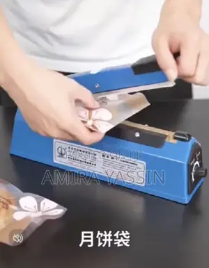 Photo - Impulse Sealer የላስቲክ ማሸጊያ