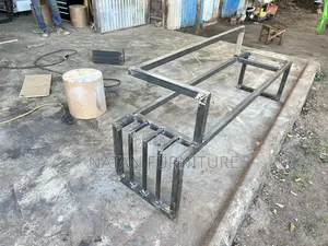 Modern Outdoor Bench With a Metal Frame and Wooden Slats