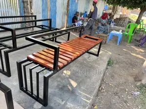 Photo - Modern Outdoor Bench With a Metal Frame and Wooden Slats