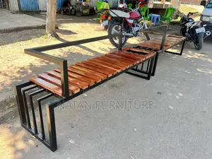 Modern Outdoor Bench With a Metal Frame and Wooden Slats