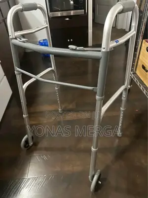 Photo - Dual Button Folding Walker With Wheels፮يwalker٧walker٨walker