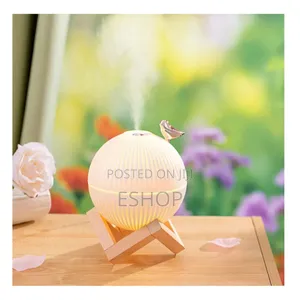 Photo - **Compact Air Humidifier – 2 Mist Levels Whisper-Quiet**