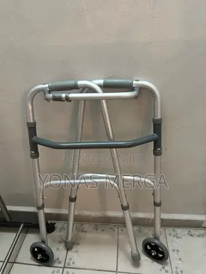 Photo - Folding Walker With 5inجحwheels- Adult (2 Button Release)