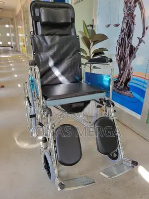 Photo - Toilet Wheelchairءءዊልቼር+Wheelchair W/Hand Brake Anti-Tipper
