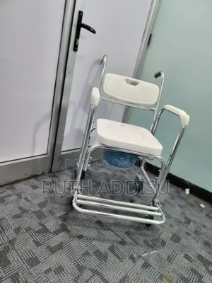 Photo - Commode Mini Wheel Chair Removable Popo With Four Small Whel