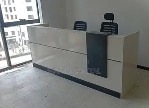 Photo - {የእንግዳ መቀበያ ጠረጴዛ }