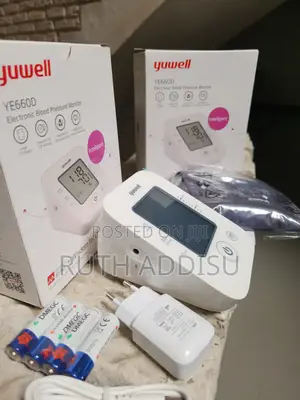 Photo - Digital Blood Pressure Monitor Features With Display Charger