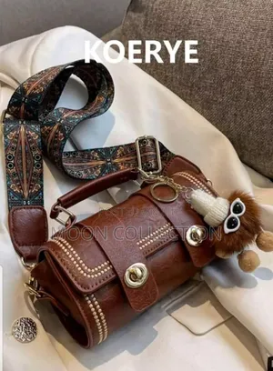 Photo - Cylinder Shaped Hand/Shoulder Bag