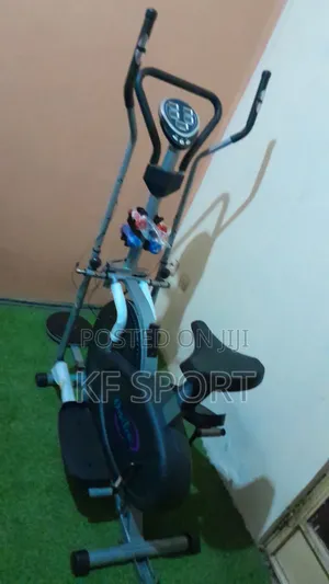 Exercise Bike With a Set of Dumbbell