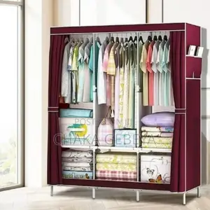 Photo - 3 Door Clothes Cabinet