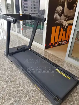 Photo - ዘመናዊ የመሮጫ ማሽን Call Us Now Treadmills Quality