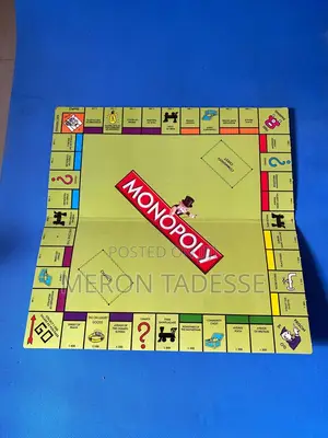 Photo - Monopoly Plus Snakes Ladders in One