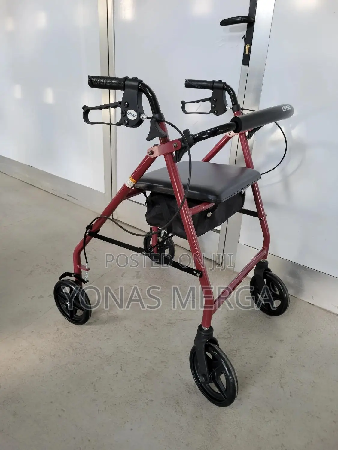 NRS Healthcare a Series 4-Wheel Walker Walking Support, Red
