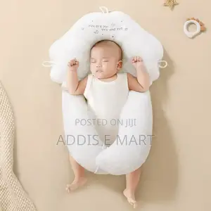 Photo - Baby Head Shaping Pillow With Body Positioner