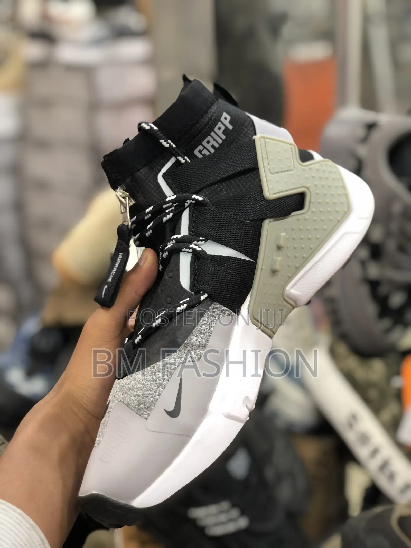 Men's Nike Air Huarache Gripp Sneakers in Black/White.