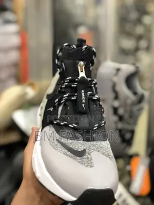 Men's Nike Air Huarache Gripp Sneakers in Black/White.