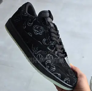 Photo - Original Air Jordan 1 Low Travis X Kaws ‘Black Cat’ Shoes