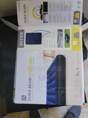 Photo - Intex Dura Beam Standard Air Mattress 203cm*152cm*25cm