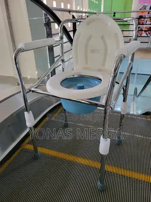 Photo - Commode Chair//Bucket
With Cutout Seatه冉bathroom for Elderly