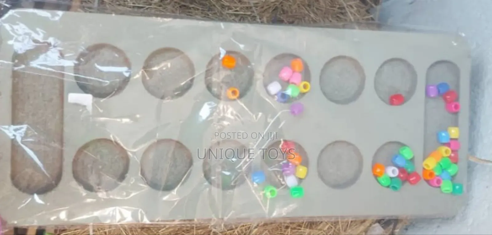 Gebeta: A Wooden Traditional Ethiopian Board Game