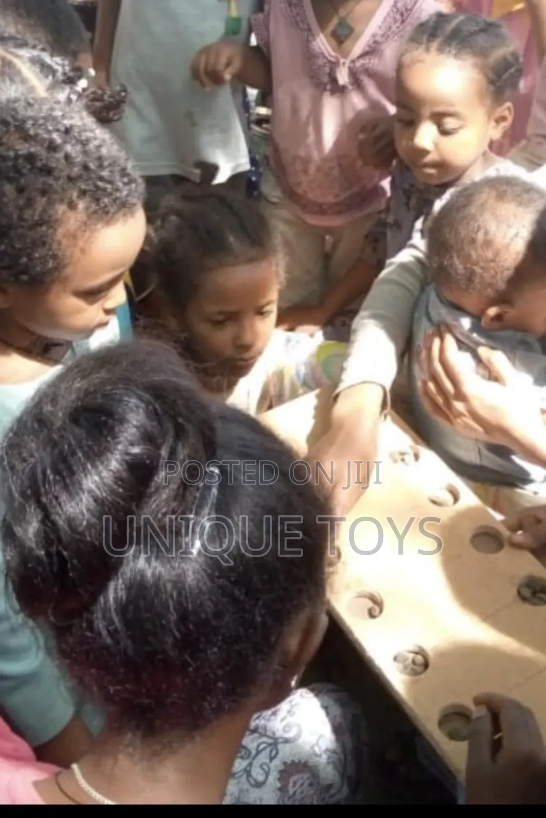Gebeta: A Wooden Traditional Ethiopian Board Game