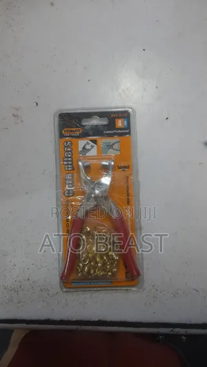 Photo - Eyelet Puncher ከምሱር መምቻ Paper Bag