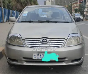 Photo - Toyota Corolla 2002 Gold