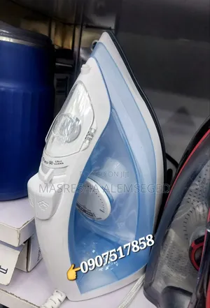 Photo - Electric Steam Iron