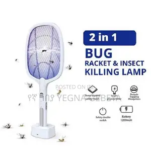 Photo - Mosquito Liquid Killer Electric Racket Set