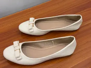 Photo - White Flat Shoes