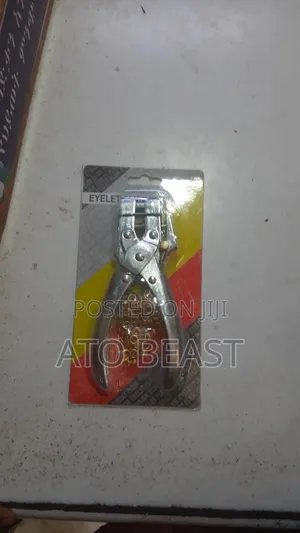 Photo - Eyelet Puncher ከምሱር መምቻ Paper Bag Work