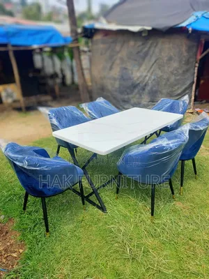 Photo - Dining Table With 6 Chairs