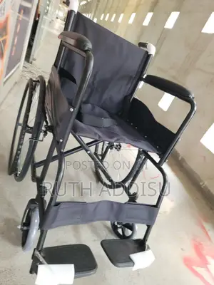 Durable Steel Wheelchair With Footrest and Arm Support